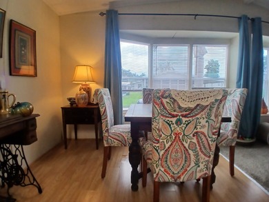 Welcome to this beautifully maintained doublewide mobile home