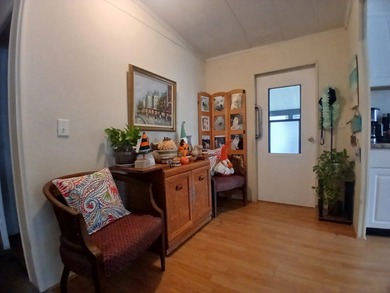 Welcome to this beautifully maintained doublewide mobile home