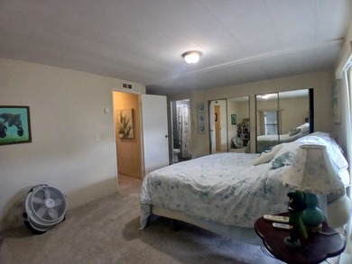 Welcome to this beautifully maintained doublewide mobile home