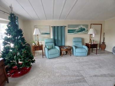 Welcome to this beautifully maintained doublewide mobile home