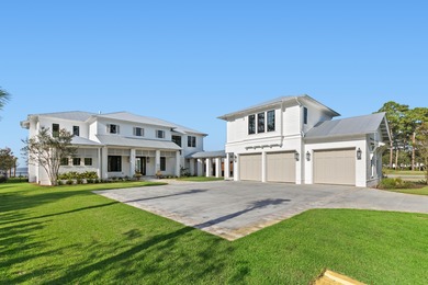 Introducing a stunning masterpiece of chic farmhouse bayfront