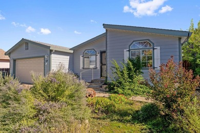 Welcome home to 69 Mesa De Oro Circle. A beautifully maintained