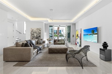 Coastal charm meets elevated elegance at this four-level, modern