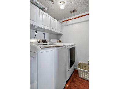 Light, updated, and welcoming--this 2BR/2BA condo in Cypress