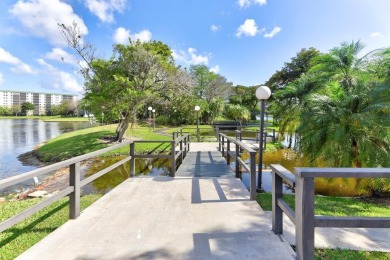 Light, updated, and welcoming--this 2BR/2BA condo in Cypress