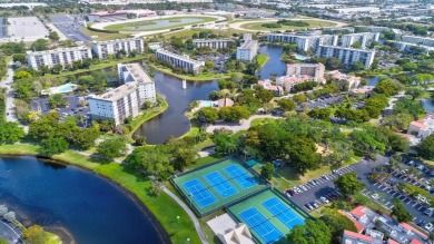 Light, updated, and welcoming--this 2BR/2BA condo in Cypress