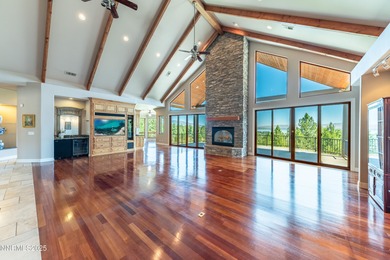 This beautifully situated custom home with views from every room
