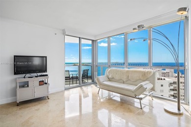 Experience elegant waterfront living at Jade Brickell from this