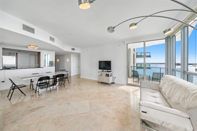 Experience elegant waterfront living at Jade Brickell from this
