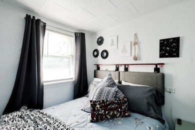 Creekside property with endless potential! This property comes