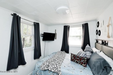 Creekside property with endless potential! This property comes