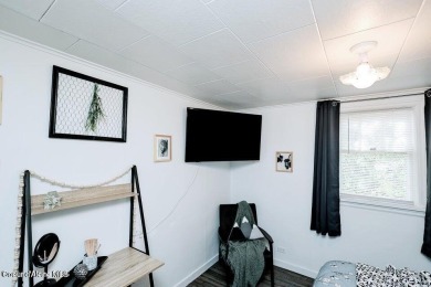 Creekside property with endless potential! This property comes