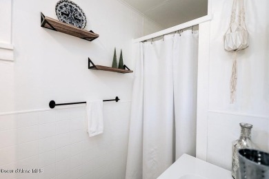 Creekside property with endless potential! This property comes