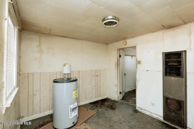 Creekside property with endless potential! This property comes