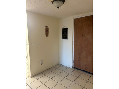 Beautiful corner unit located in a gated community offering