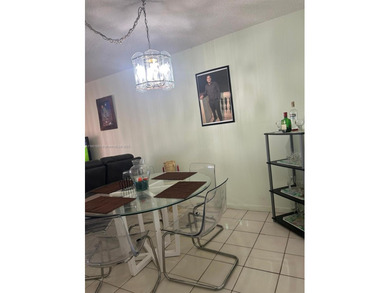 Beautiful corner unit located in a gated community offering