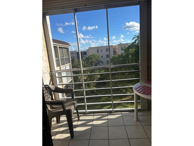 Beautiful corner unit located in a gated community offering