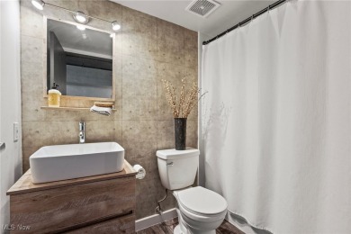 Welcome to 1133 W 9th St #315, a stylish and modern 1-bedroom