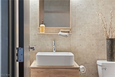 Welcome to 1133 W 9th St #315, a stylish and modern 1-bedroom