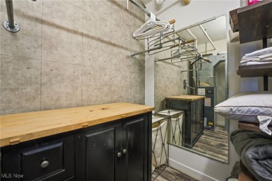 Welcome to 1133 W 9th St #315, a stylish and modern 1-bedroom