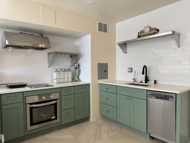 OCEANFRONT building offering an updated one-bedroom condo with