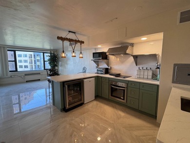 OCEANFRONT building offering an updated one-bedroom condo with