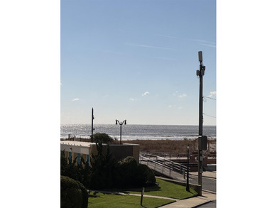 OCEANFRONT building offering an updated one-bedroom condo with