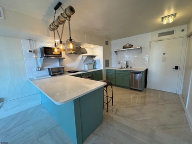 OCEANFRONT building offering an updated one-bedroom condo with