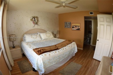 Price Improvement on this spacious top floor 2 bedroom condo in