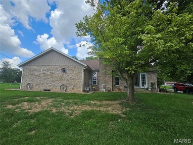 Welcome to the 2700 square ft full brick home, perfectly