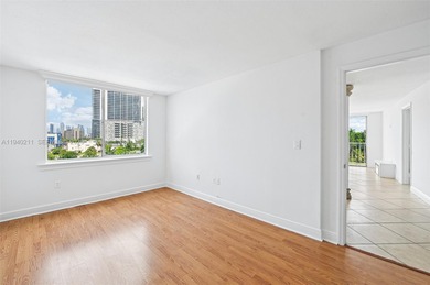 Welcome to this exceptional 2-bedroom, 2-bath condo perched on