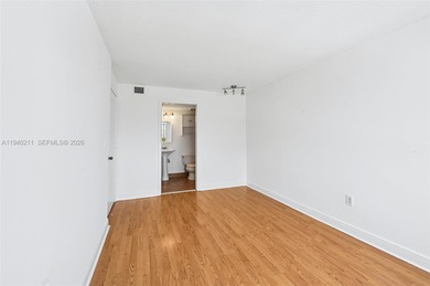 Welcome to this exceptional 2-bedroom, 2-bath condo perched on