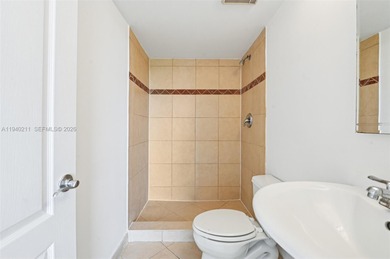 Welcome to this exceptional 2-bedroom, 2-bath condo perched on