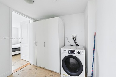 Welcome to this exceptional 2-bedroom, 2-bath condo perched on