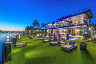 Welcome to 733 Middle River Drive in the gated community of