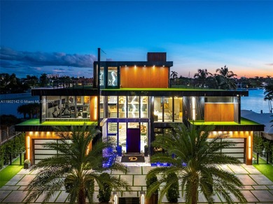 Welcome to 733 Middle River Drive in the gated community of