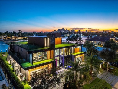 Welcome to 733 Middle River Drive in the gated community of