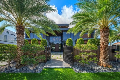 Welcome to 733 Middle River Drive in the gated community of