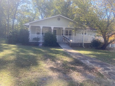 Nice one level over full basement, across the street from lake