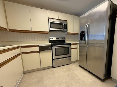 Spacious 1 bedroom, 1.5 bath condo with some ocean and bay views