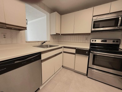 Spacious 1 bedroom, 1.5 bath condo with some ocean and bay views