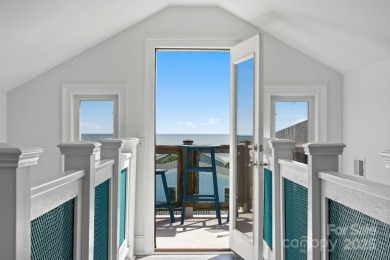 Beautifully updated coastal retreat just steps from the beach