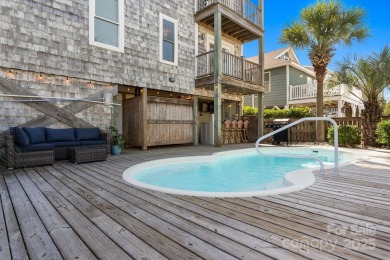 Beautifully updated coastal retreat just steps from the beach