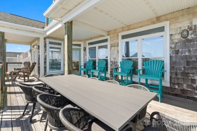 Beautifully updated coastal retreat just steps from the beach