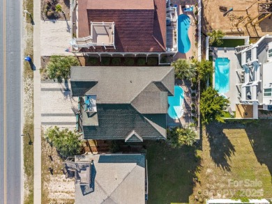 Beautifully updated coastal retreat just steps from the beach