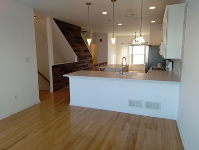 Bayfront Townhouse in Lower Chelsea with deeded 40 foot boat