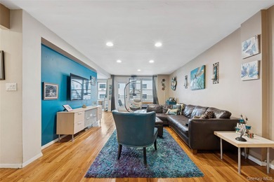 Just 1 block from the beach, this beautifully updated and