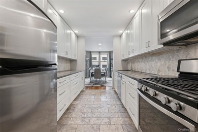 Just 1 block from the beach, this beautifully updated and