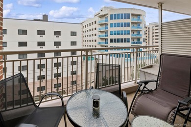 Just 1 block from the beach, this beautifully updated and