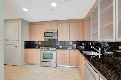 Step into this elegant two-bedroom, two-and-a-half-bathroom